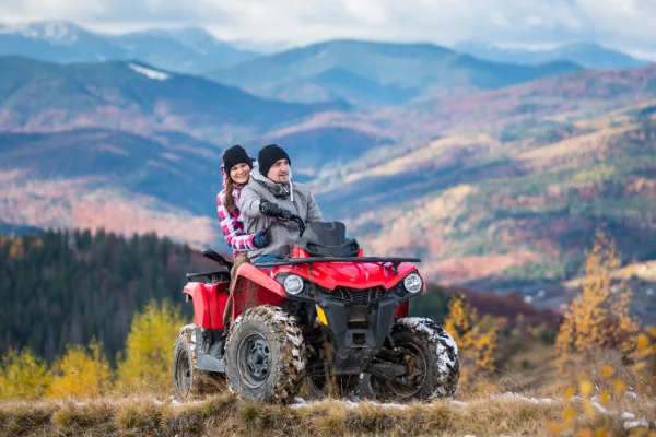 Couple on red ATV